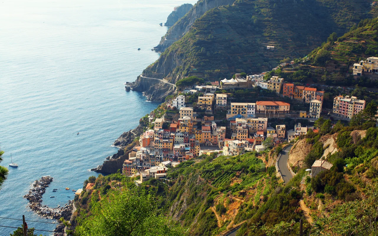Manarola village and terraced hills above the Ligurian Sea in Cinque Terre
